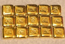 Vàng thế giới khởi sắc khi đồng USD suy yếu